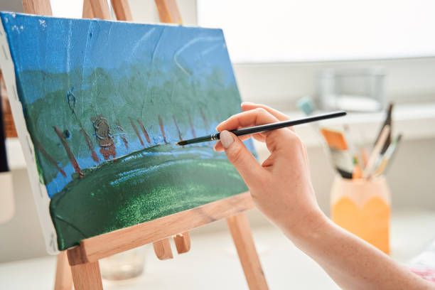 istock Woman spending quarantine and enjoying hobby 1304065709