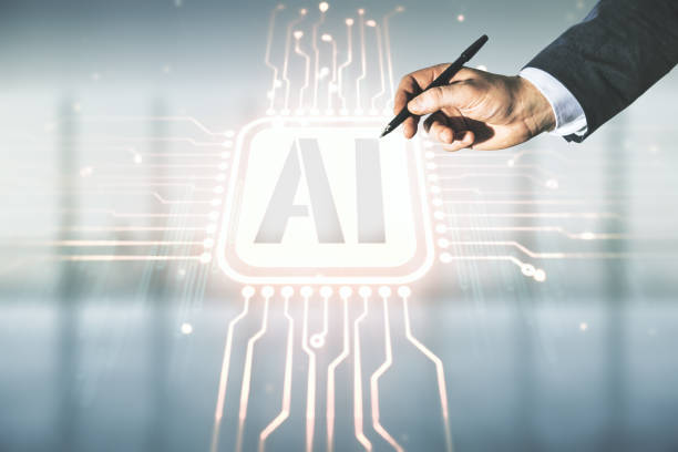 istock Man hand with pen working with abstract virtual artificial Intelligence symbol hologram on blurred office background. Multiexposure 1304065999