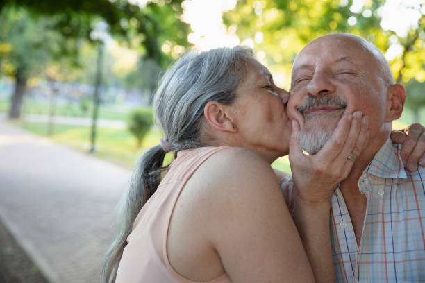 istock Senior couple having fun outside 1304068779