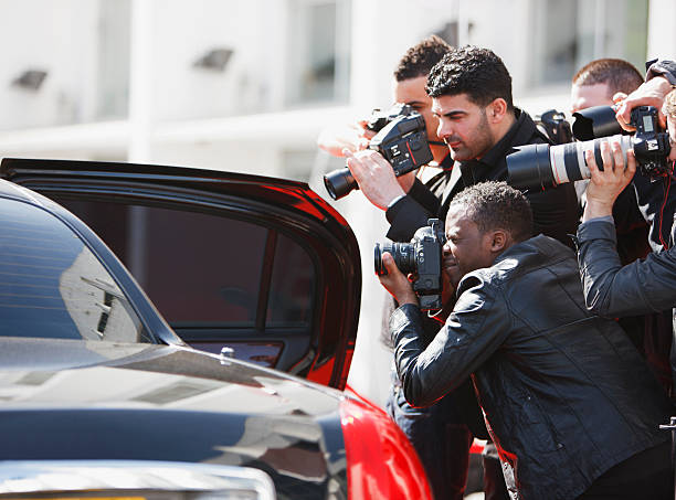 Paparazzi taking pictures of celebrity in car  rich black men pictures stock pictures, royalty-free photos & images