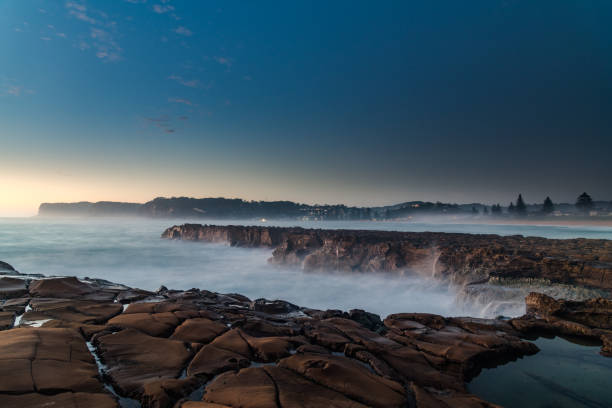 istock Early Morning Seascape from Rock Platform 1304070947