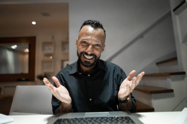 istock Man on a video call at home - Webcam point of view 1304073966