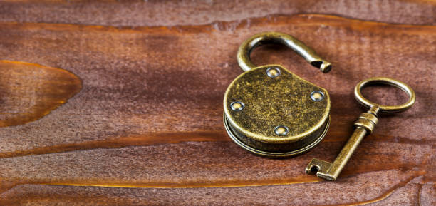 istock Escape room game lock and key 1304074045