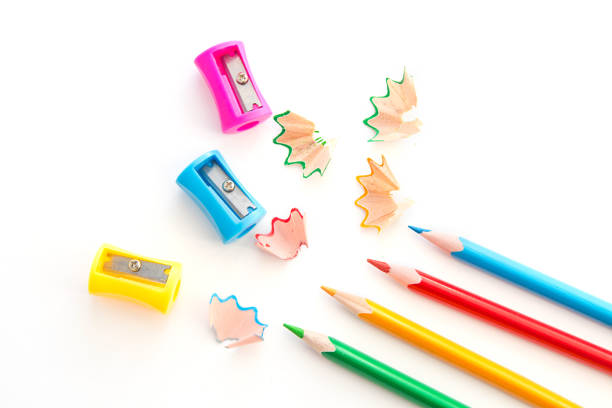 istock colored pencils and colored pencil sharpeners, isolated on white background 1304081021