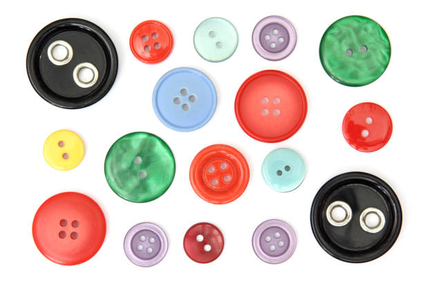 istock Set of multicolored sewing buttons cut out and isolated on white background 1304082465