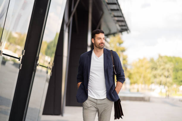 istock Businessman walking on his way to work 1304083819