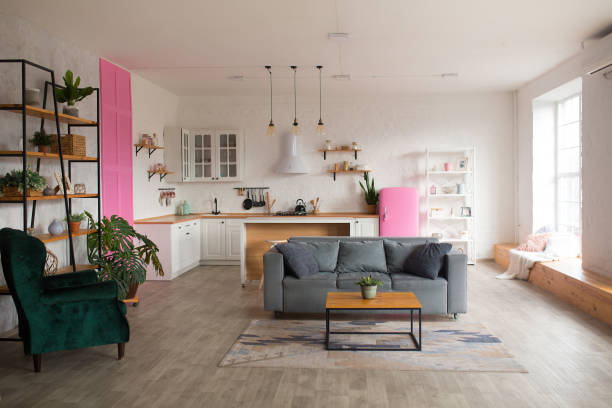 istock Modern open plan kitchen with living area and big window 1304089760