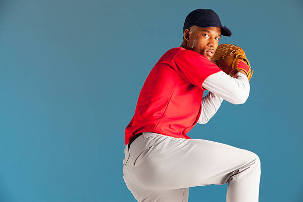 jogador de beisebol liquidação de campo - baseball player baseball baseball uniform baseball cap - fotografias e filmes do acervo