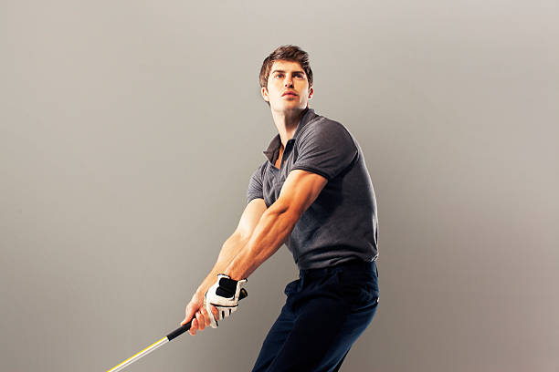 Golf player ready to swing club  golf concentration stock pictures, royalty-free photos & images