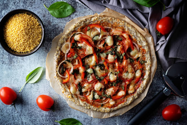 Millet pine nuts Chia seeds pizza crust with tomato; red bell pepper, onion and basil