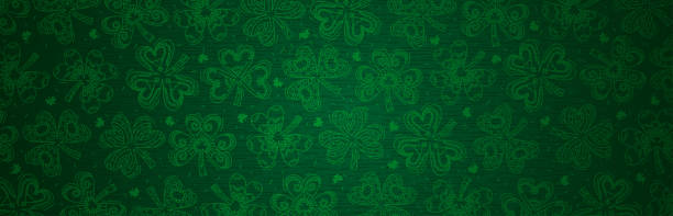 istock Green Patricks Day greeting banner with green clovers. Patrick's Day holiday design. Horizontal background, headers, posters, cards, website. Vector illustration 1304094006