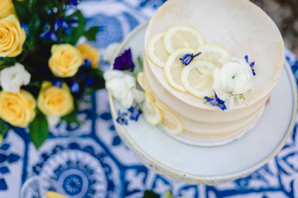 Small wedding cake with blue and yellow lemon accents