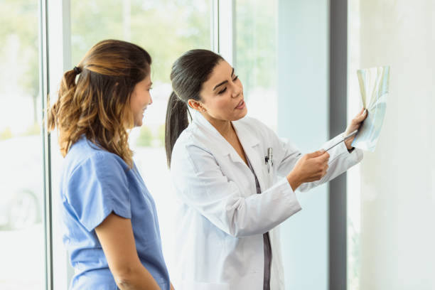istock Medical colleagues discuss patient's x-ray 1304095877