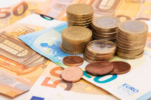 istock banknotes and coins in cash, money 1304095902