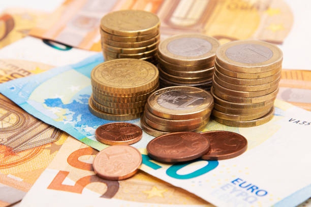 istock banknotes and coins in cash, money 1304095904