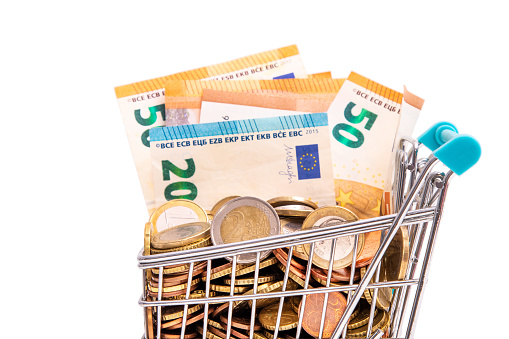 shopping cart with cash isolated