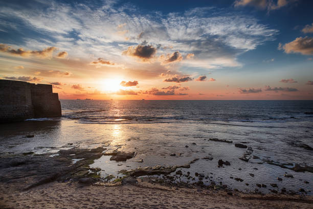 istock sunset on the Mediterranean coast, Israel 1304096726