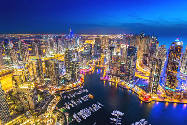 istock City and Marina Dock at blue hour with cloudy sky 1304097966