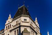 Romantic neo-renaissance stately townhouse, Art Nouveau facade, historical building in old town, most prestigious boulevard Parizska Street at sunny day, Prague, Czech Republic, February 14, 2021