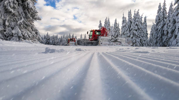 istock Red piste caterpillar for snow grooming 1304101776