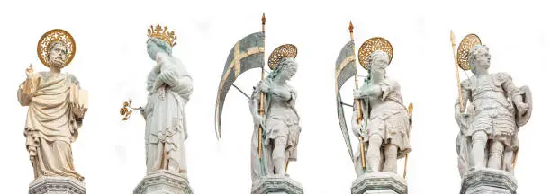 Photo of Set of original ancient top roof sculptures of symbol of Venice at the Piazza San Marco isolated at white background, Venice, Italy, closeup, details.