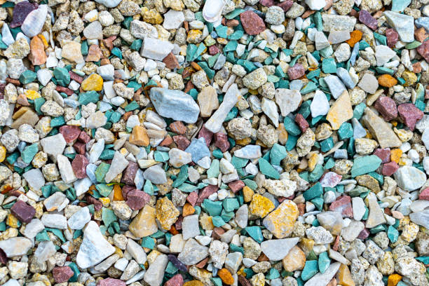 istock Sea pebbles. Pebble background. Wet stones. Multi-colored pebbles. Sea shore. Rocky texture from natural materials. Vacation, travel, building concept. 1304101866
