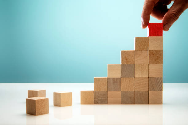 istock Red Block Stacked on Top Symbolizing Business Growth 1304106495