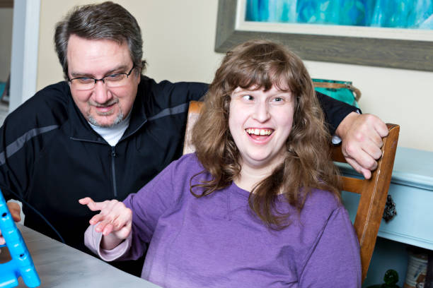 Happy disabled young woman proud of her choice during virtual learning at home - fotografia de stock