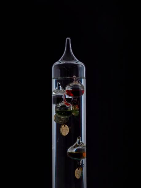 istock Stark illumination of a Galileo thermometer 1304106511