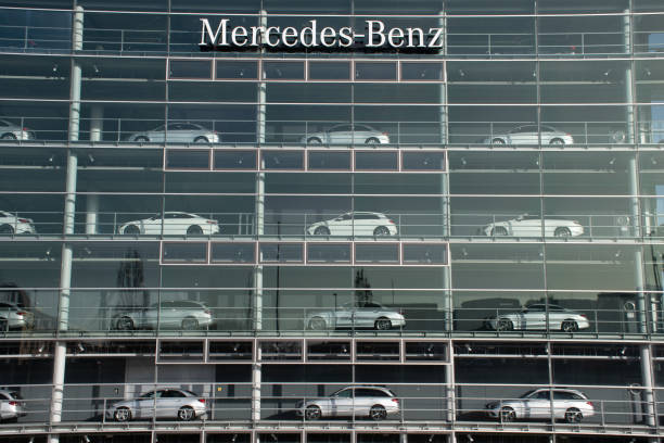 Cars for Sale Displayed in Windows of Mercedes-Benz Building in Munich, Germany Munich, Germany - February 25, 2021: Cars for sale on display in the windows of the Mercedes-Benz building. mercedes benz photos stock pictures, royalty-free photos & images