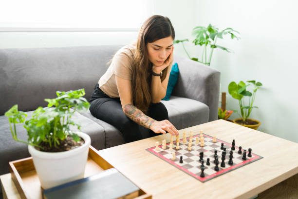 istock Attractive woman in her 20s practicing her favorite hobby 1304112912