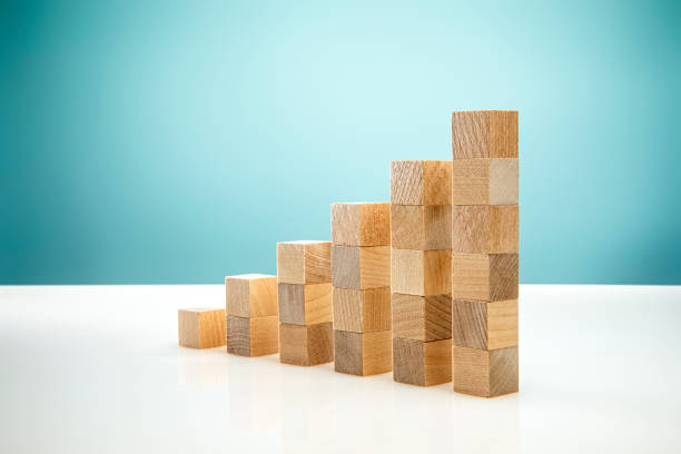 istock Angled Blocks on Blue Background symbolizing Business Growth 1304114069