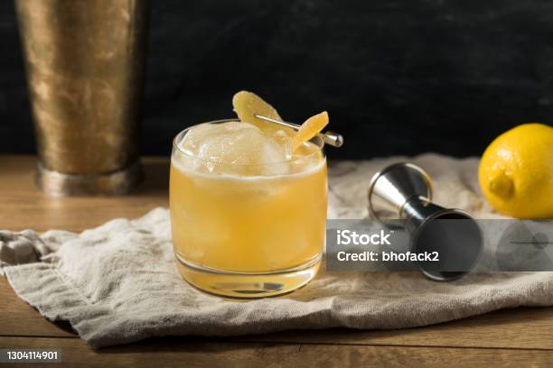 Boozy Alcoholic Penicillin Cocktail Stock Photo - Download Image Now - Cocktail, Lemon - Fruit, Penicillin