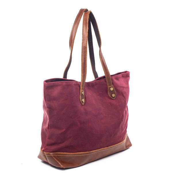 istock Red womans canvas bag on a white background 1304114992