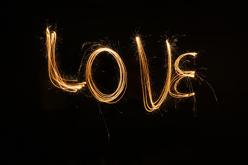 Long exposure light writing LOVE.