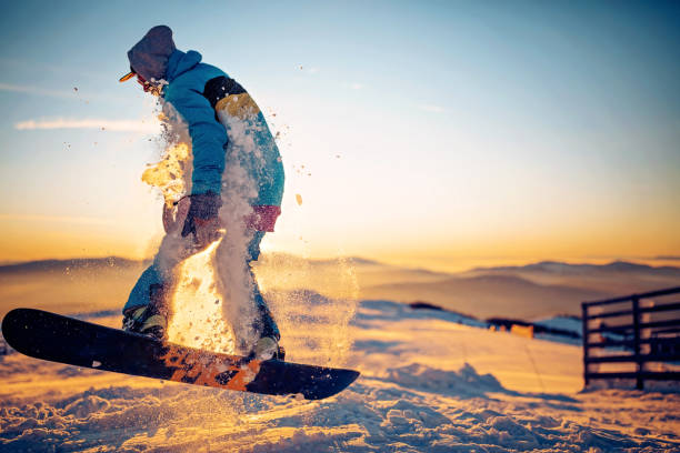 istock Snowboarder having fun at ski resort 1304126730