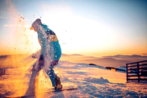 istock Snowboarder having fun at ski resort 1304126816