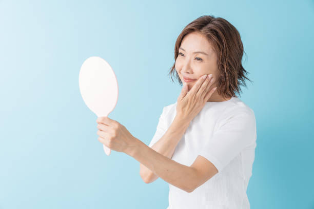 istock senior age woman to see a mirror 1304127598