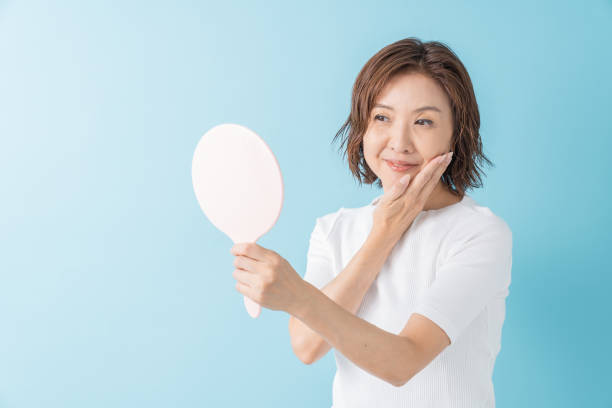 istock senior age woman to see a mirror 1304127773