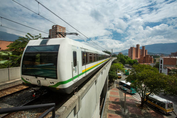 Metro-type mass transportation system that directly serves the city and its surrounding municipalities Medellin, Antioquia. Colombia - February 25, 2017. The Metro was the first modern mass transportation system in Colombia. Its construction began on April 30, 1985 and was inaugurated on November 30, 1995 metro medellin stock pictures, royalty-free photos & images