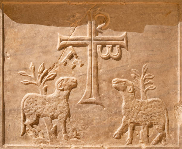 Ravenna - The relief from old christian tomb (with the cross and paradise symbolic) in the church Basilica di Sant Francesco.