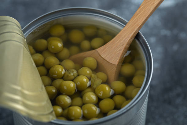 istock Opened tin full with green olives 1304135287