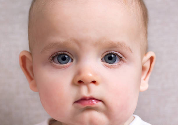 istock Cute caucasian baby face. Close-up portrait. 1304137097