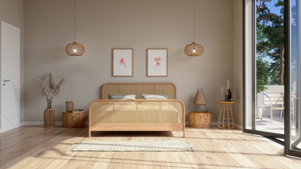 bedroom interior in beige color with wicker bed furniture, pendant lights, balcony and posters on the wall. - fotos de boho imagens e fotografias de stock