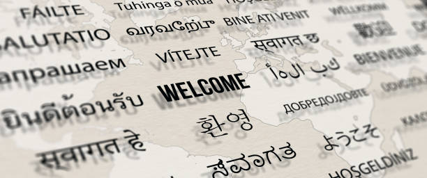 Welcome in different language on paper with world map background. Welcome in different language on paper with world map background. Depth of field image. Words cloud concept. different religion stock pictures, royalty-free photos & images