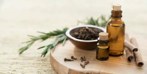 Photo of Essential Oils with Rosemary, Cloves & Cinnamon.