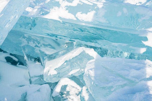 istock Broken icicles on frozen ice of Baikal lake 1304143176