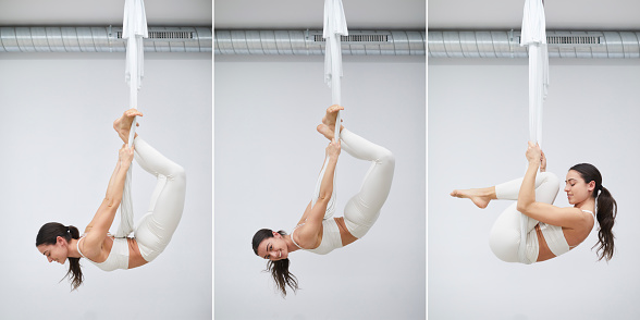A young woman in different flying yoga postures