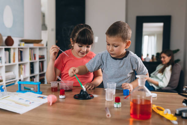 istock kids do chemical experiments at home 1304153006