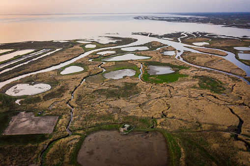 Aerial view of Arcachon Basin, Audenge and Biganos, the delta of the river Eyre at sunset, France, Gironde, Aquitaine. High quality photo